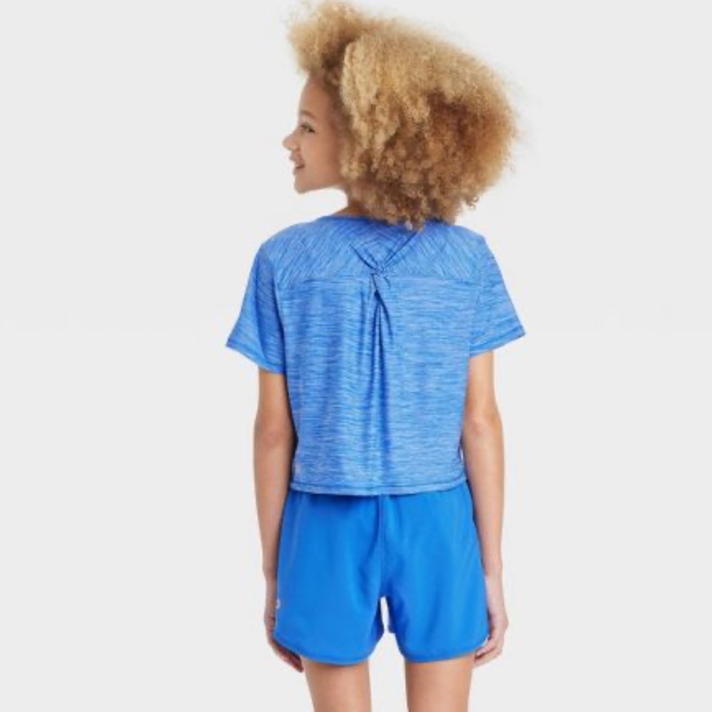 All in motion Stuido Girls Blue top, twist in back, short sleeves, New with Tags